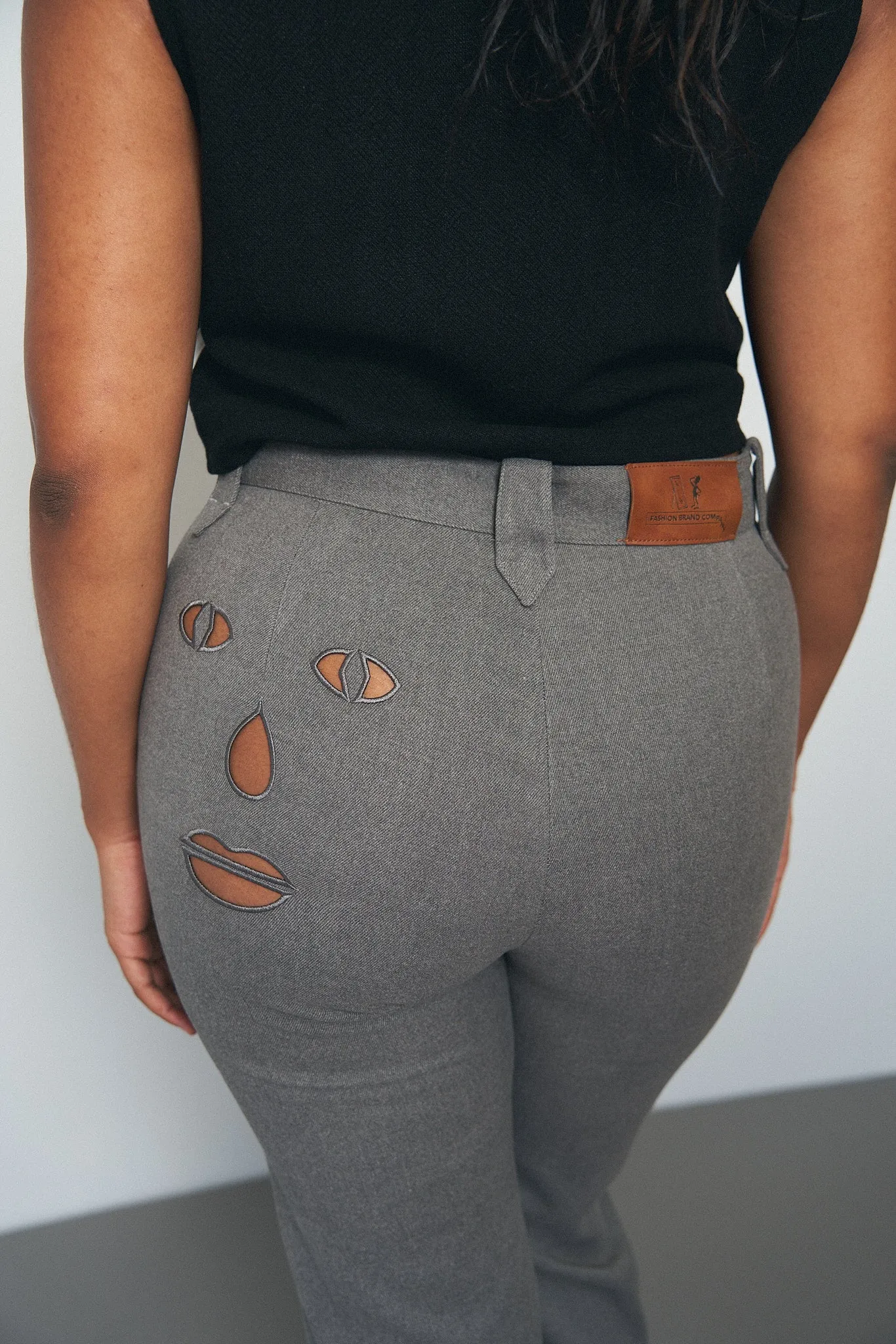 Face cut out Trousers Gray